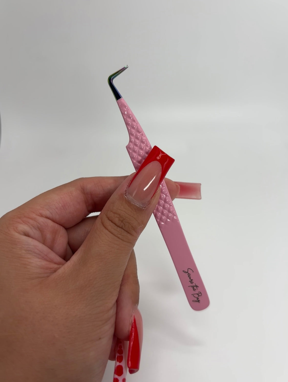 “Secure the Bag” 90 degree tweezer